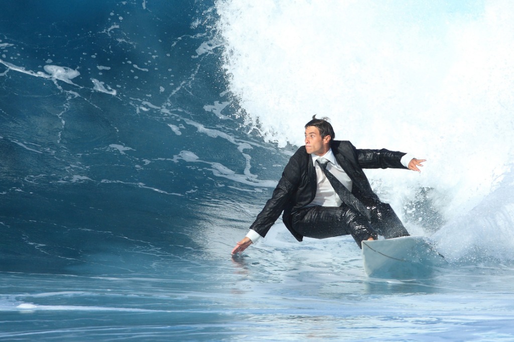 young-business-man-surfing-picture-id119807633